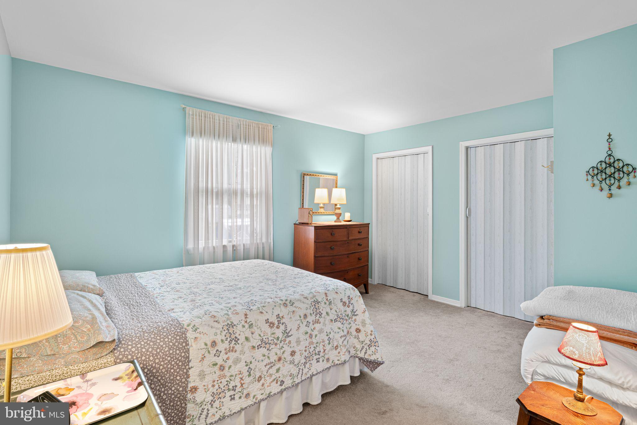 333 South Atlantic Avenue Haddonfield, NJ 08033 - Photo 13 of 19 a bedroom with a bed and wooden floor