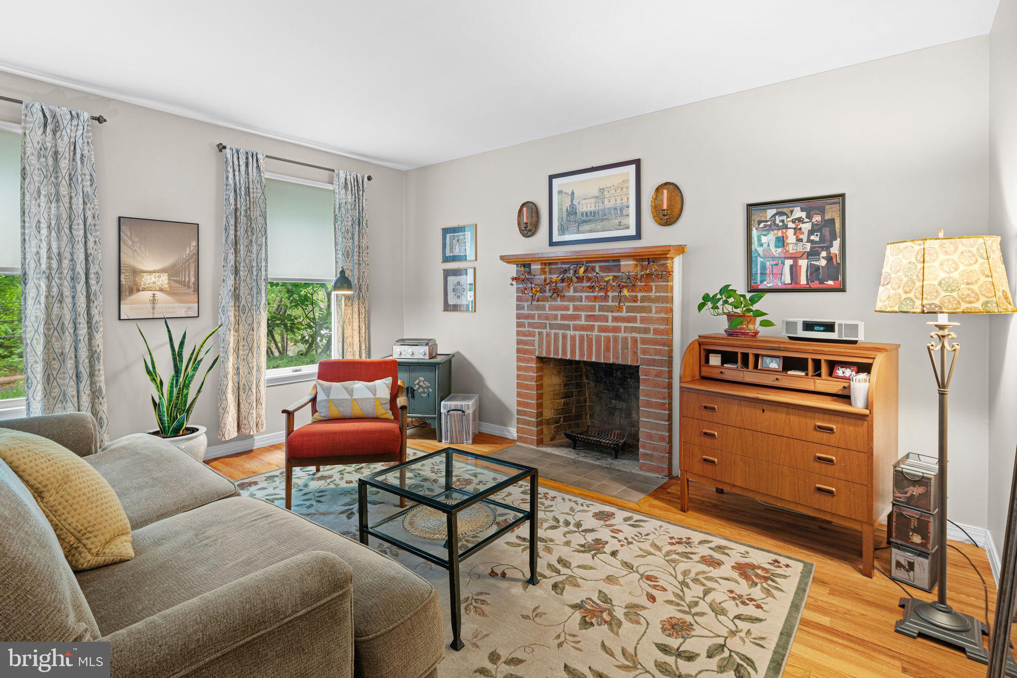 333 South Atlantic Avenue Haddonfield, NJ 08033 - Photo 3 of 19 a living room with furniture and a fireplace