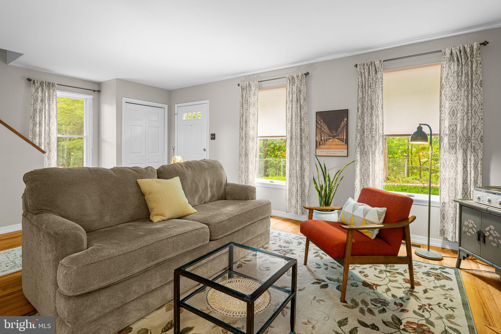 333 South Atlantic Avenue Haddonfield, NJ 08033 - Photo 4 of 19 a living room with furniture and a large window
