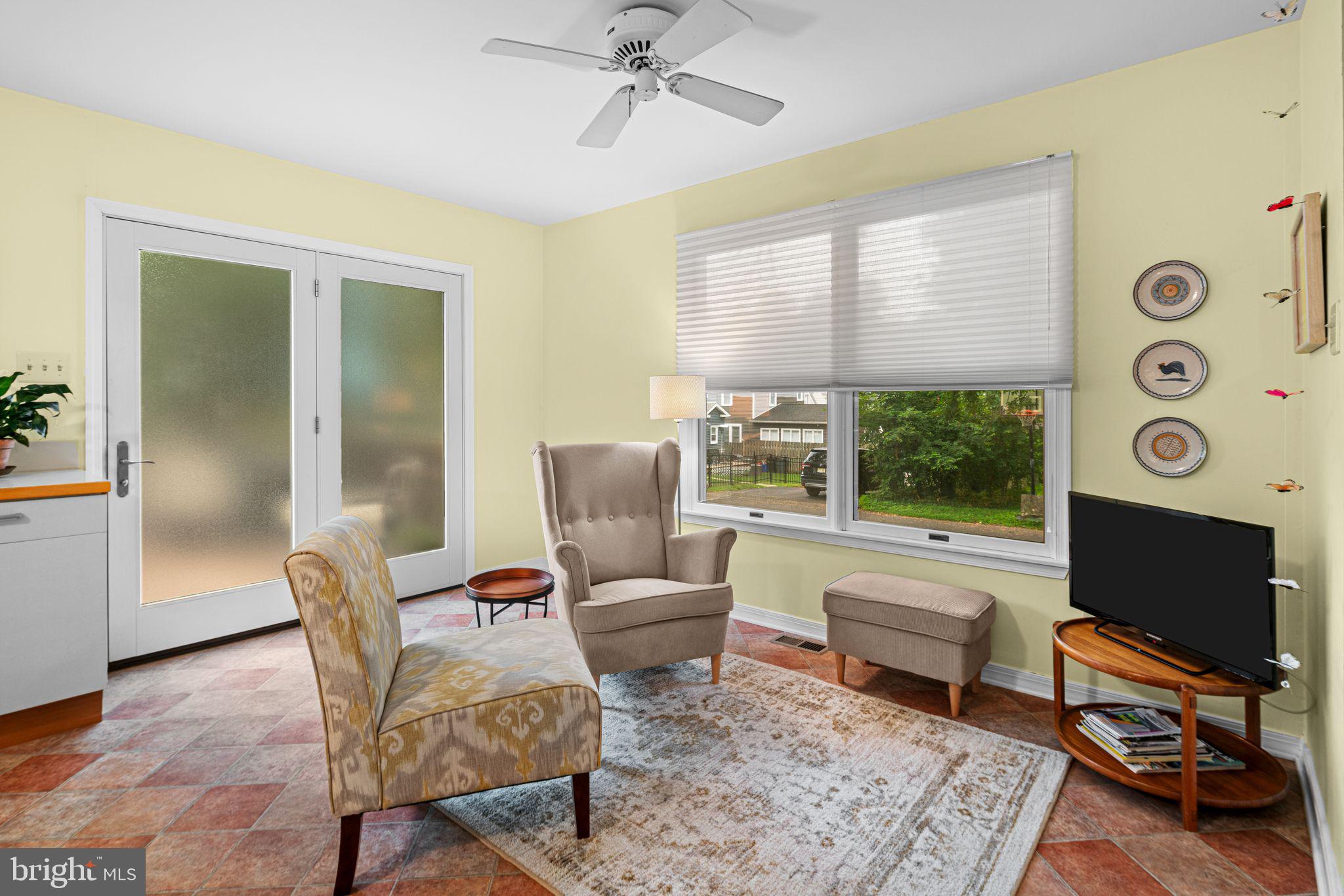 333 South Atlantic Avenue Haddonfield, NJ 08033 - Photo 8 of 19 a living room with furniture and a flat screen tv