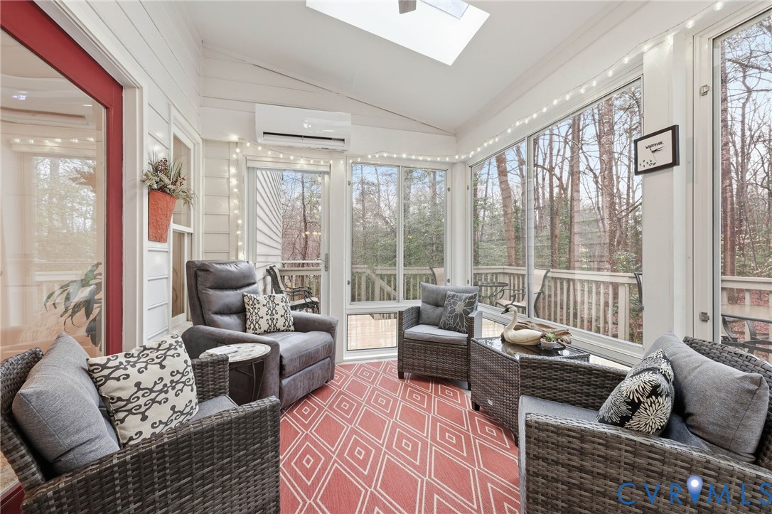 5601 Sandstone Ridge Road Midlothian, VA 23112 - Photo 18 of 43 a living room with furniture and a large window