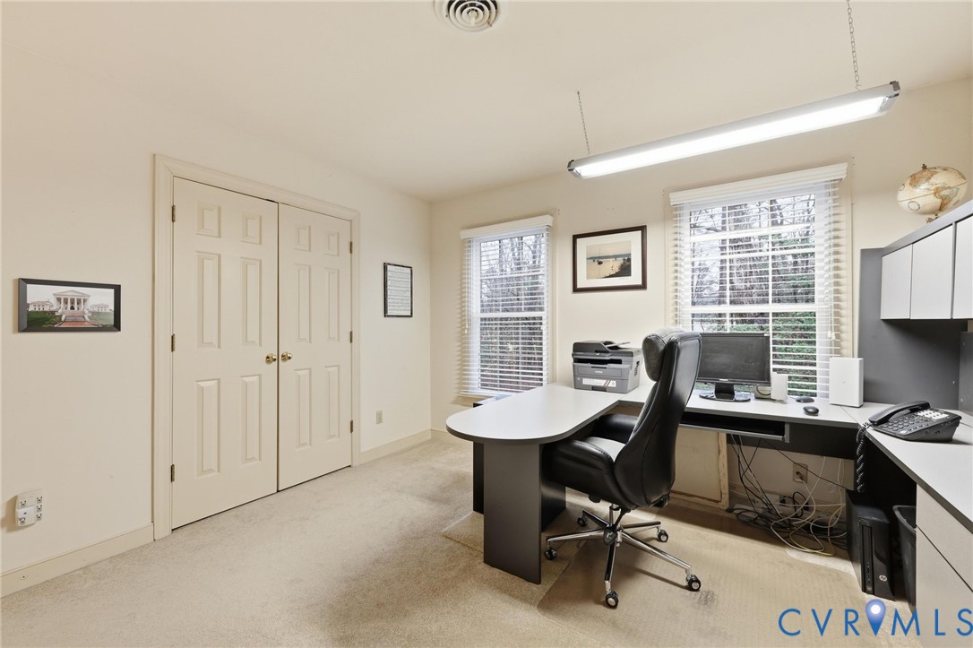 5601 Sandstone Ridge Road Midlothian, VA 23112 - Photo 24 of 43 a view of a workspace with furniture and a window