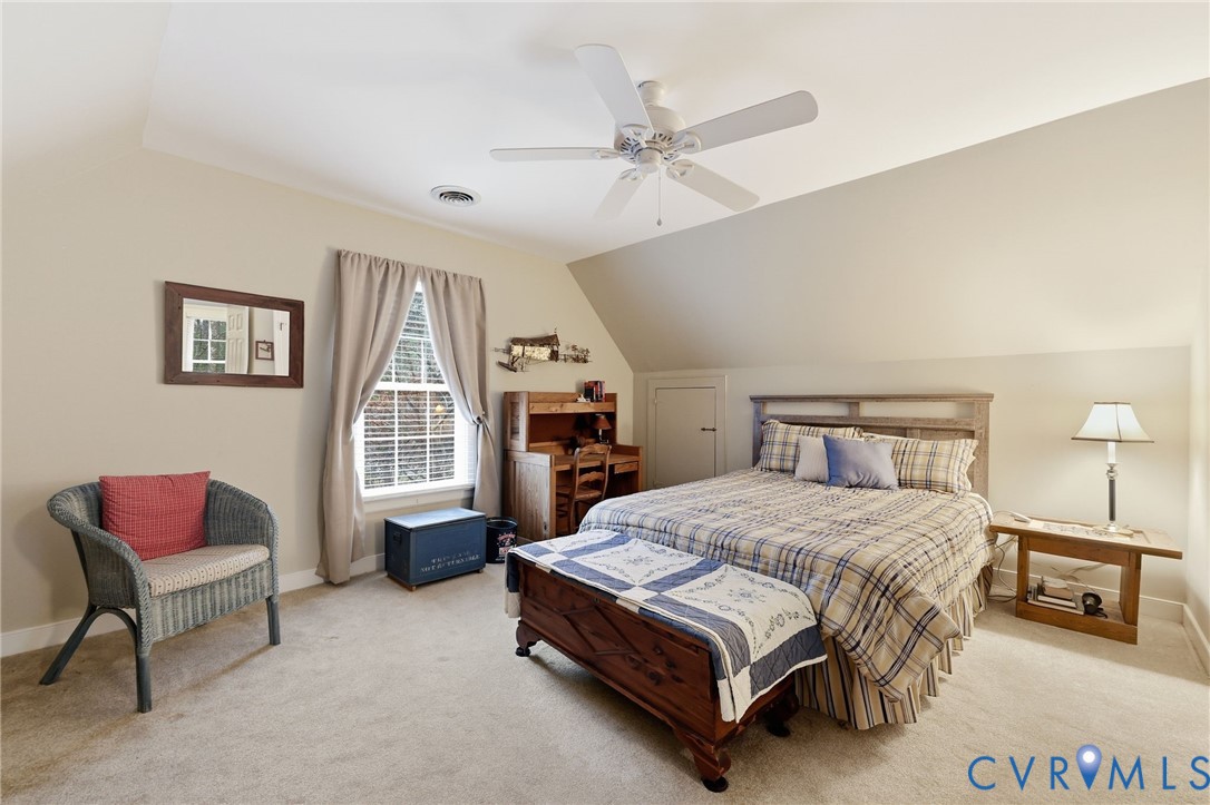 5601 Sandstone Ridge Road Midlothian, VA 23112 - Photo 29 of 43 a bedroom with a bed chair and window