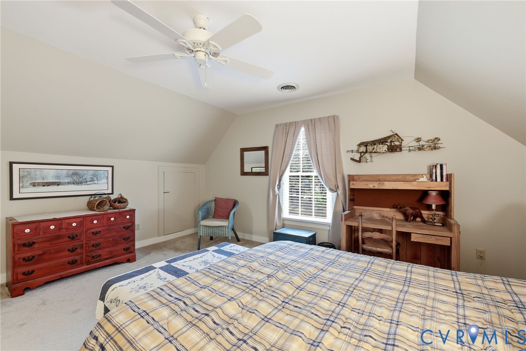 5601 Sandstone Ridge Road Midlothian, VA 23112 - Photo 30 of 43 a bedroom with a bed dresser and a window