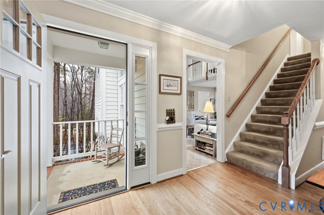 5601 Sandstone Ridge Road Midlothian, VA 23112 - Photo 3 of 43 a view of a hallway with wooden floor and entryway