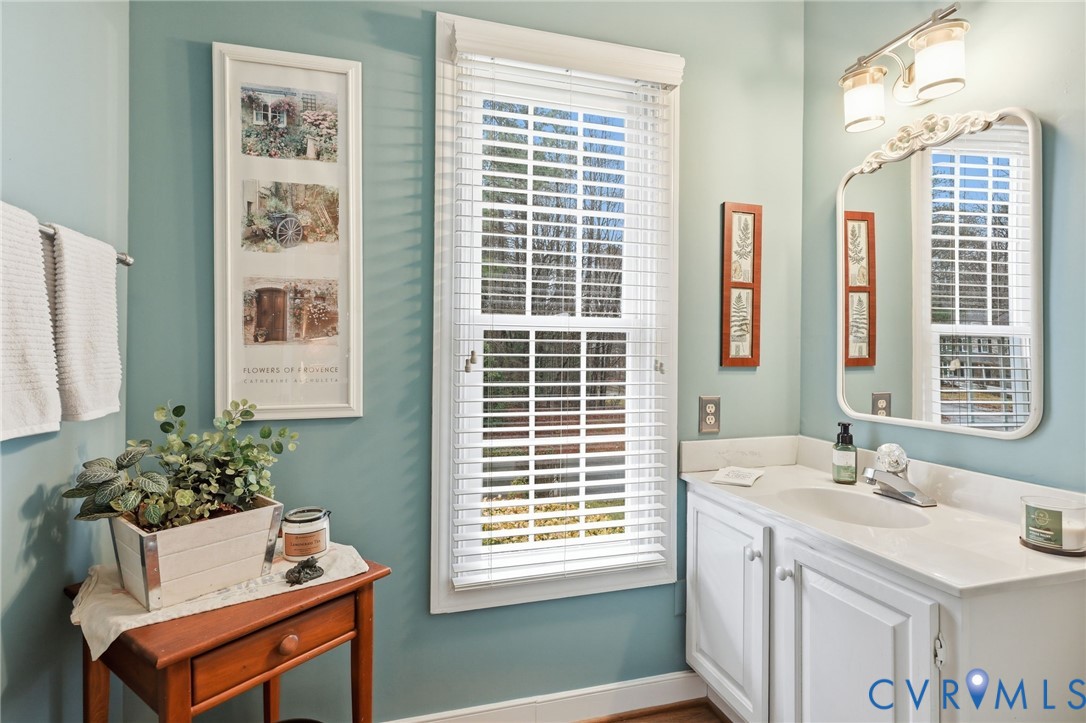 5601 Sandstone Ridge Road Midlothian, VA 23112 - Photo 31 of 43 a bathroom with sink and mirror