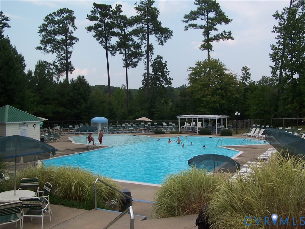 5601 Sandstone Ridge Road Midlothian, VA 23112 - Photo 40 of 43 a view of a swimming pool with a patio