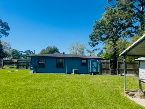 a house view with a outdoor space