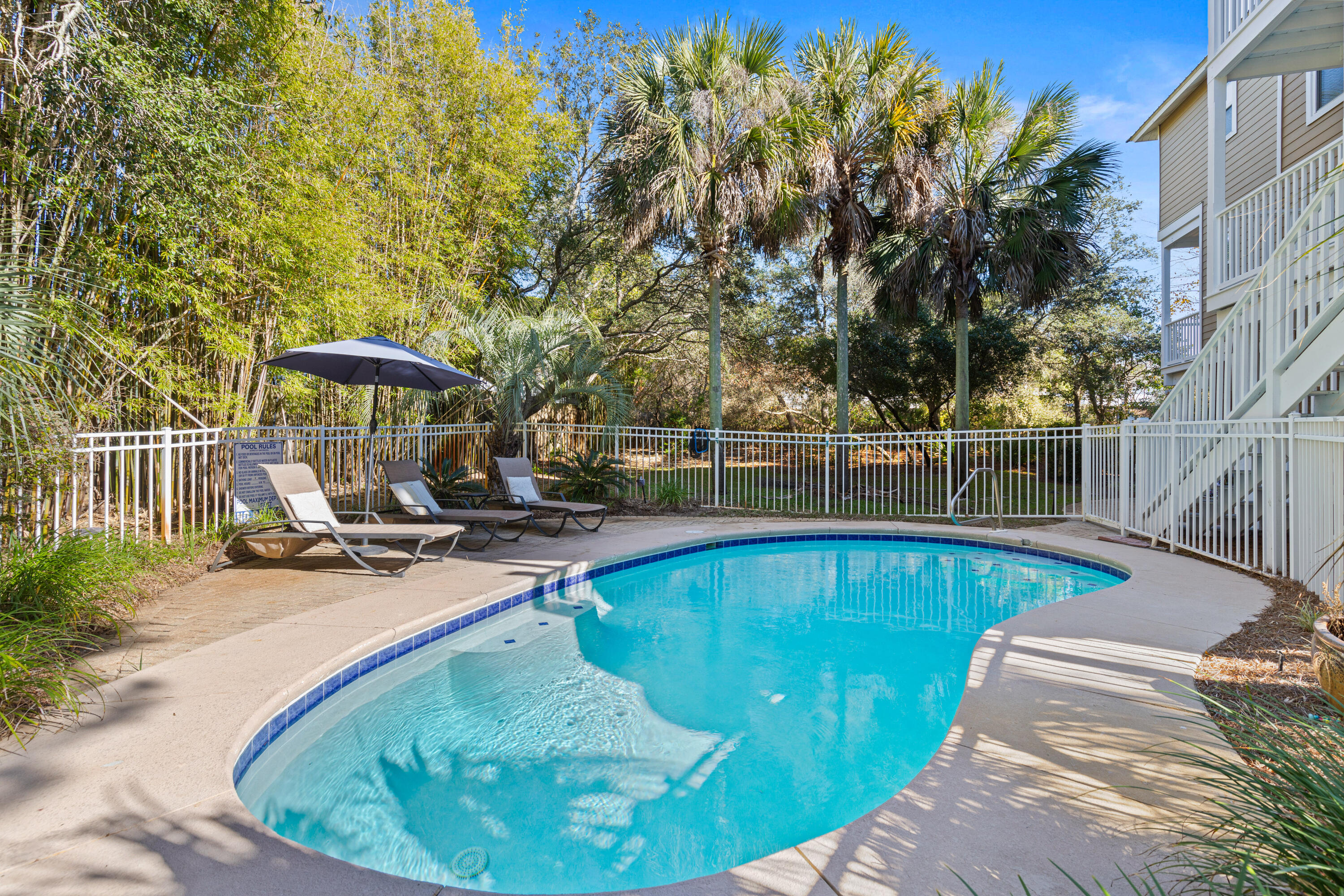 19 Buddy Street Santa Rosa Beach, FL 32459 - Photo 11 of 23 a view of a swimming pool with sitting area