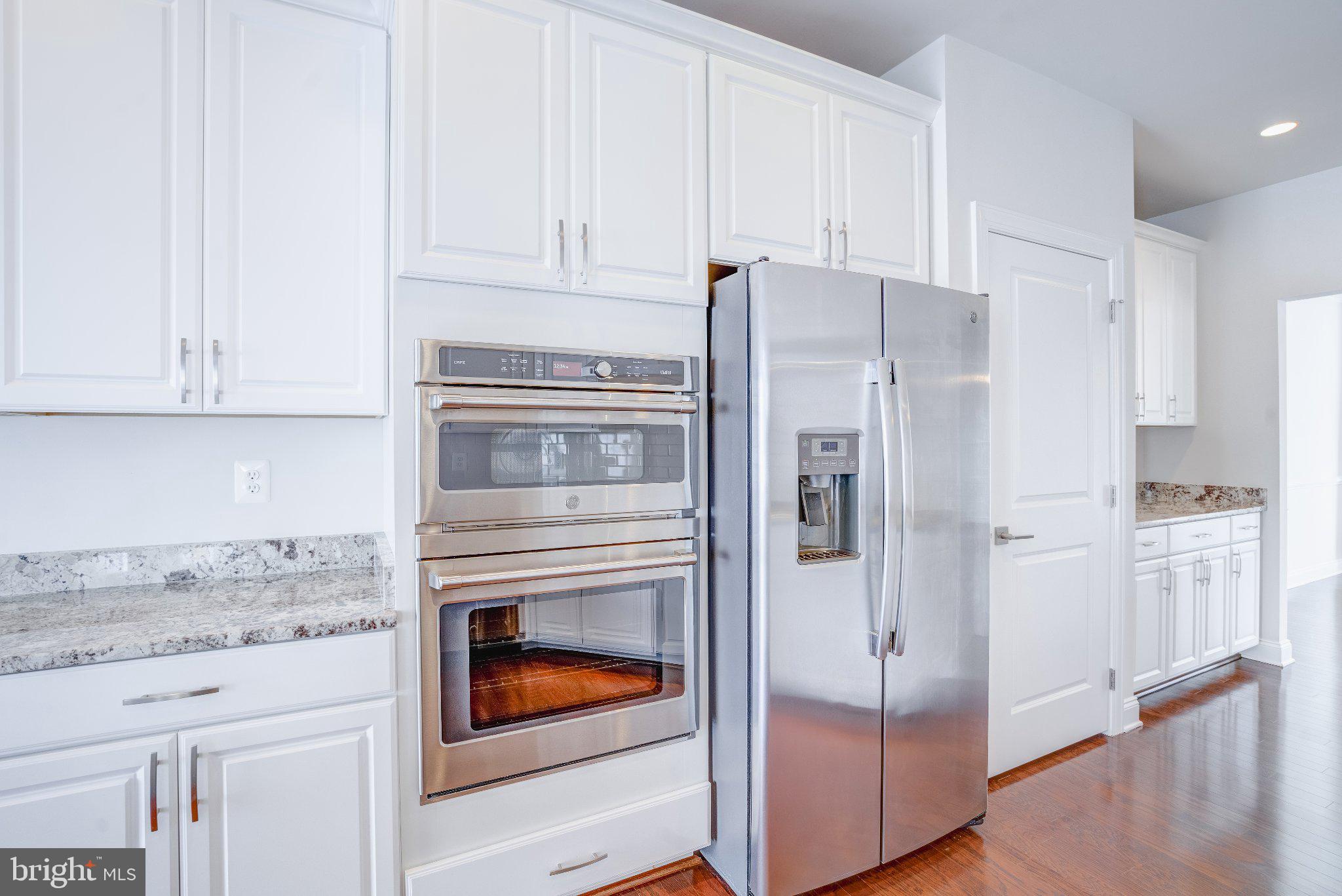 2517 Cherry Tree Road Hanover, MD 21076 - Photo 19 of 61 Sleek modern kitchen with elegance.