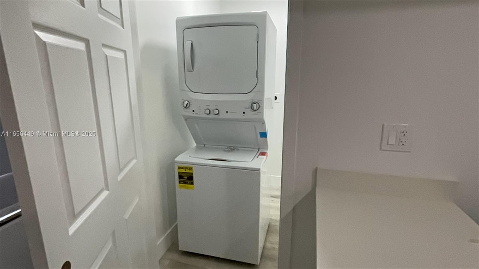 3034 Northwest 14th Avenue Miami, FL 33142 - Photo 7 of 8 a utility room with dryer and washer