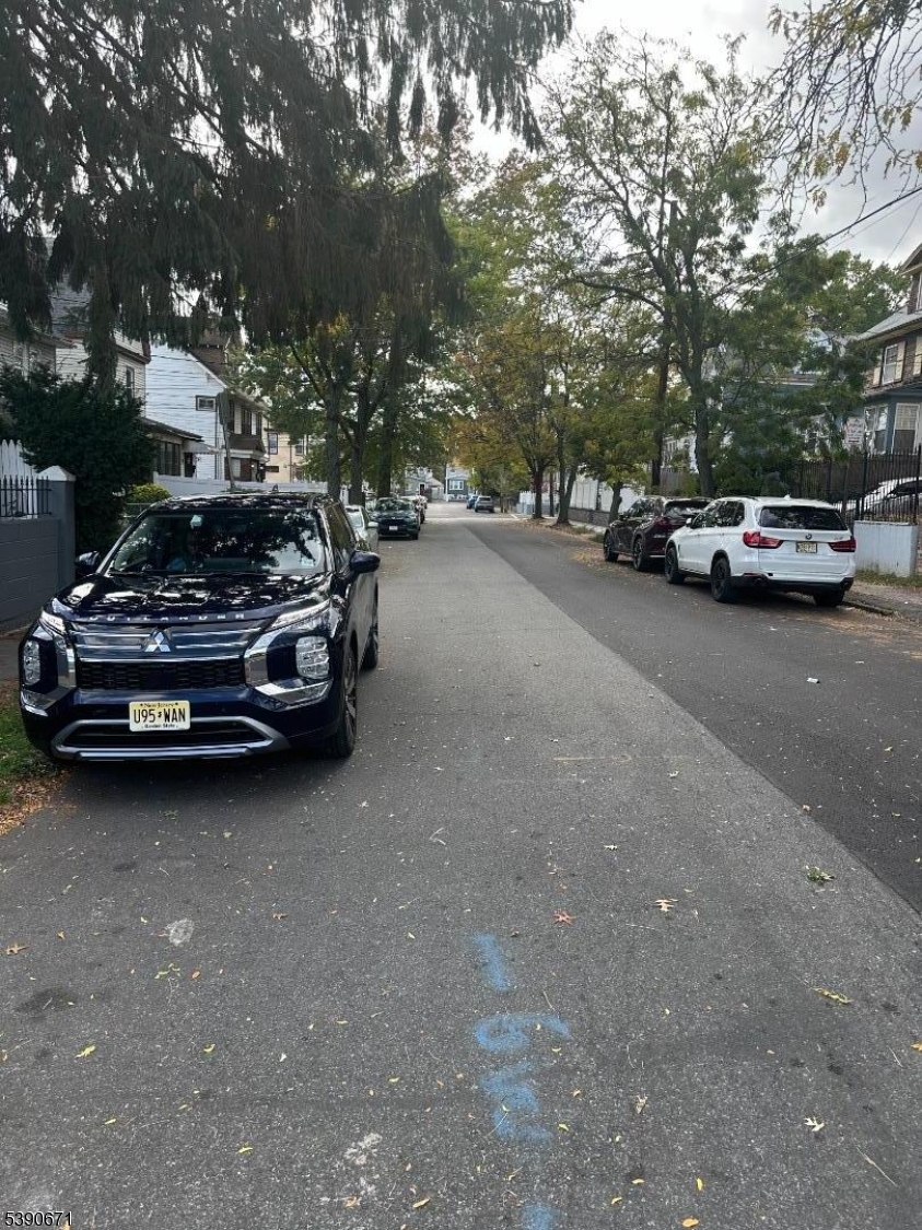 86 Mead Street Newark, NJ 07106 - Photo 7 of 8 a car parked on the side of a street