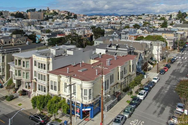 an aerial view of multiple house