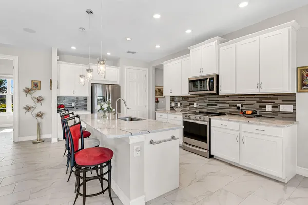 $869,000 | 18763 Lake Hammock Drive, Naples, FL 34114