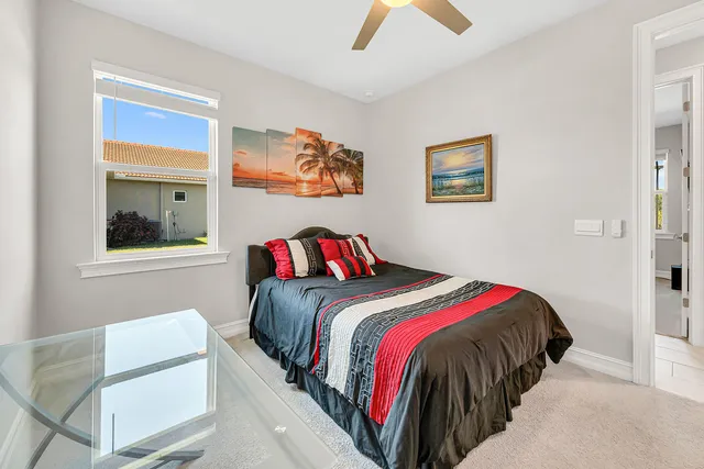 a bed room with a bed and a couch