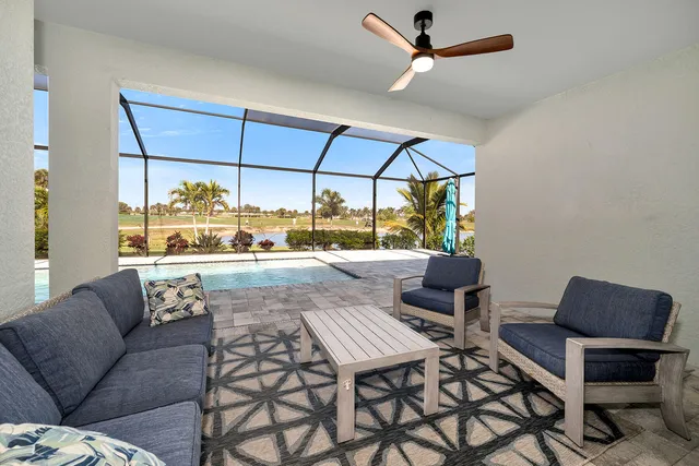 a living room with furniture and a table