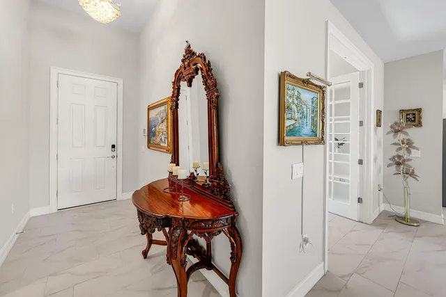 a view of a livingroom with furniture and windows