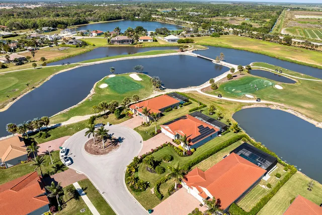 an aerial view of a city with lawn chairs