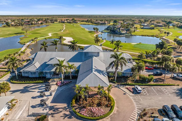an aerial view of a house with a ocean view