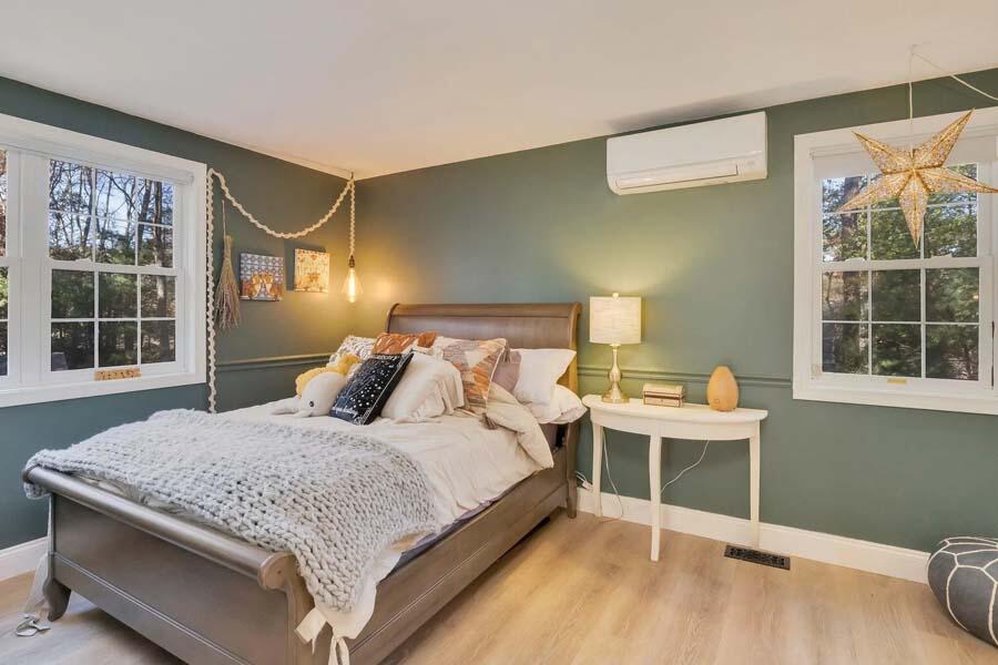 186 Cedric Road Centerville, MA 02632 - Photo 23 of 42 a bedroom with a large bed and a window