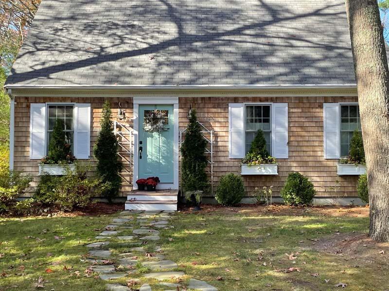 186 Cedric Road Centerville, MA 02632 - Photo 3 of 42 a front view of house with outdoor space