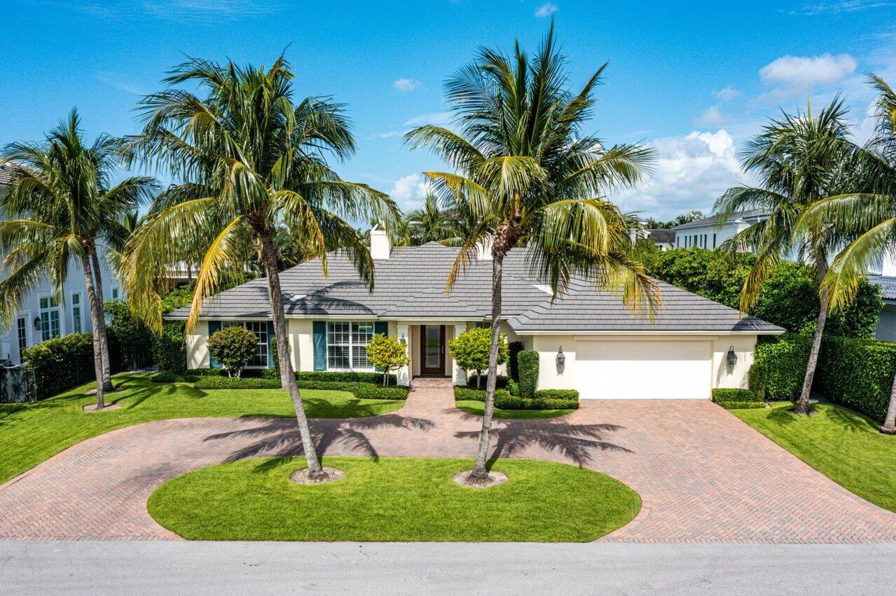 2377 East Silver Palm Road Boca Raton, FL 33432 - Photo 40 of 40 a front view of a house with a yard