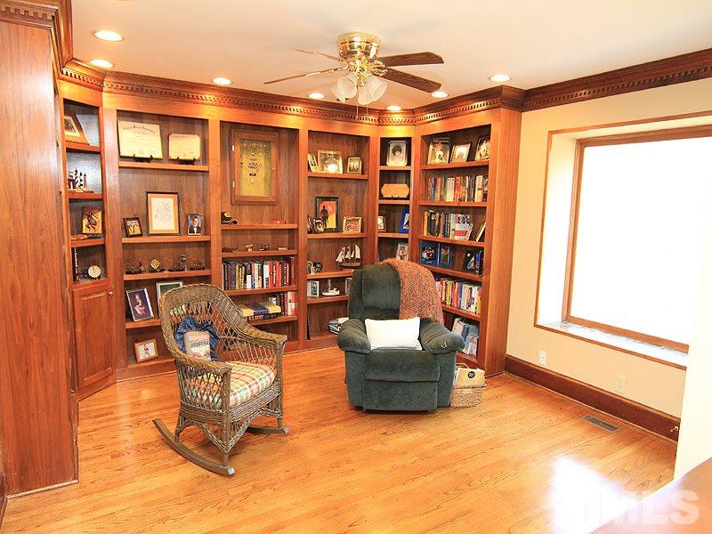 2204 Customs House Court Raleigh, NC 27615 - Photo 13 of 25 Located off the family room, the office/study has lots of built ins and room for a desk area.