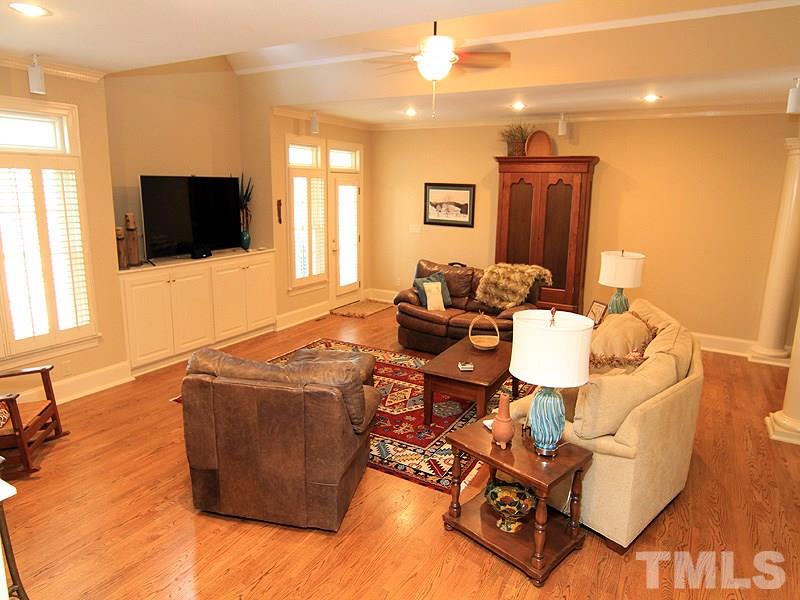 2204 Customs House Court Raleigh, NC 27615 - Photo 14 of 25 This was added on in 2009 (all permitted). What a wonderful place for family and friends to gather. Wired for speakers,niche with built in cabinets for your TV, ceiling fan, lots of windows and a great layout for furniture (or a pool table/game room too!