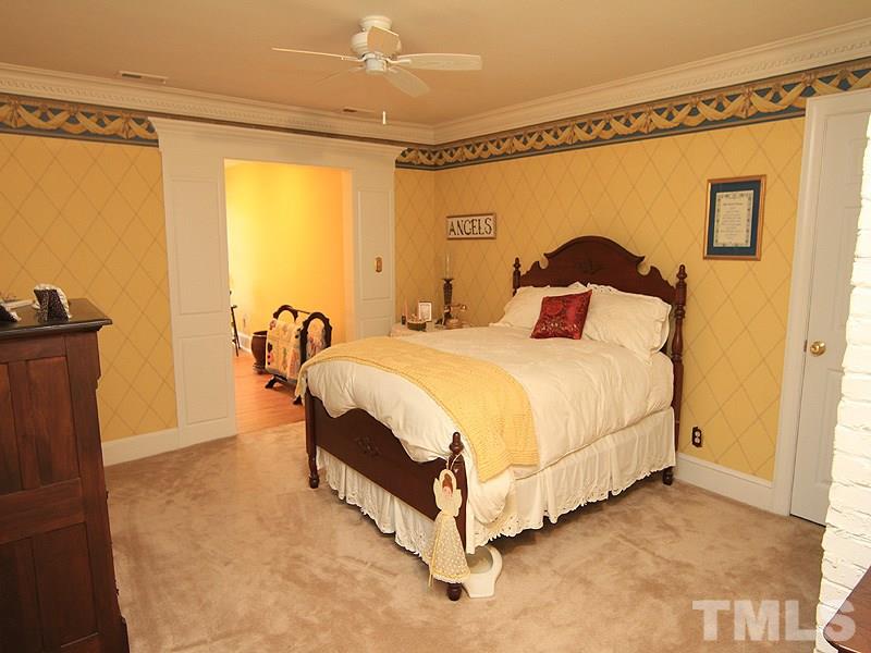 2204 Customs House Court Raleigh, NC 27615 - Photo 23 of 25 Notice the detailed trim work to the alcove in the upstairs bedroom.