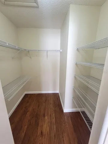 a view of an empty walk in closet