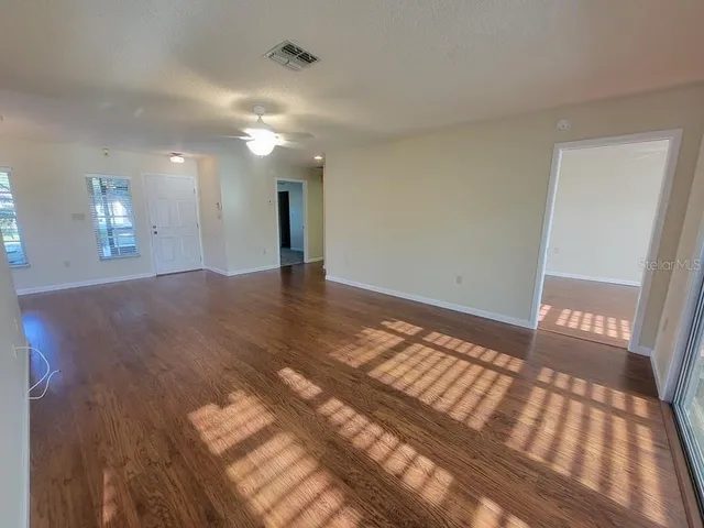 a view of an empty room and window