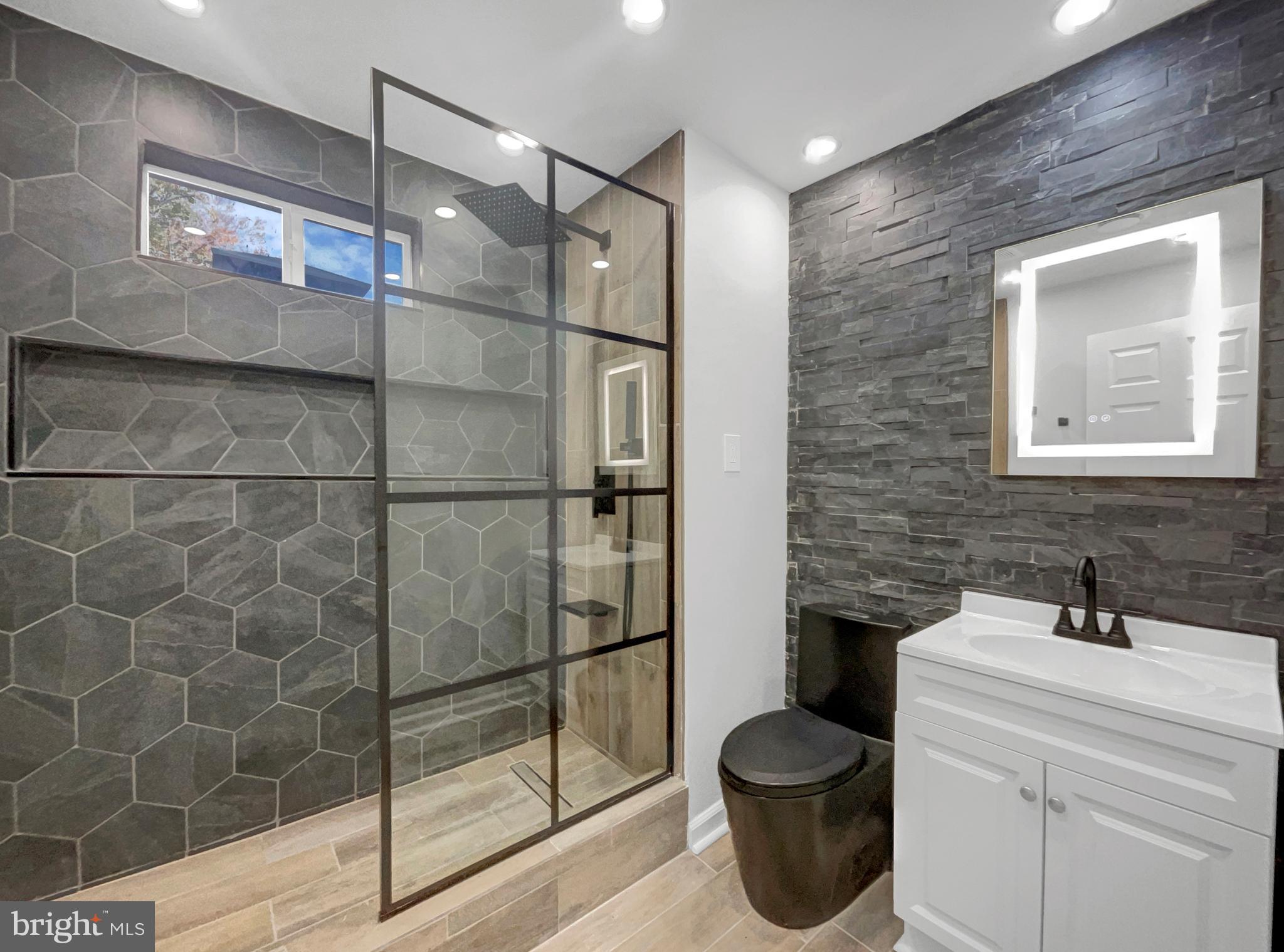 1101 Pine Lane Accokeek, MD 20607 - Photo 23 of 43 a bathroom with a toilet and a sink