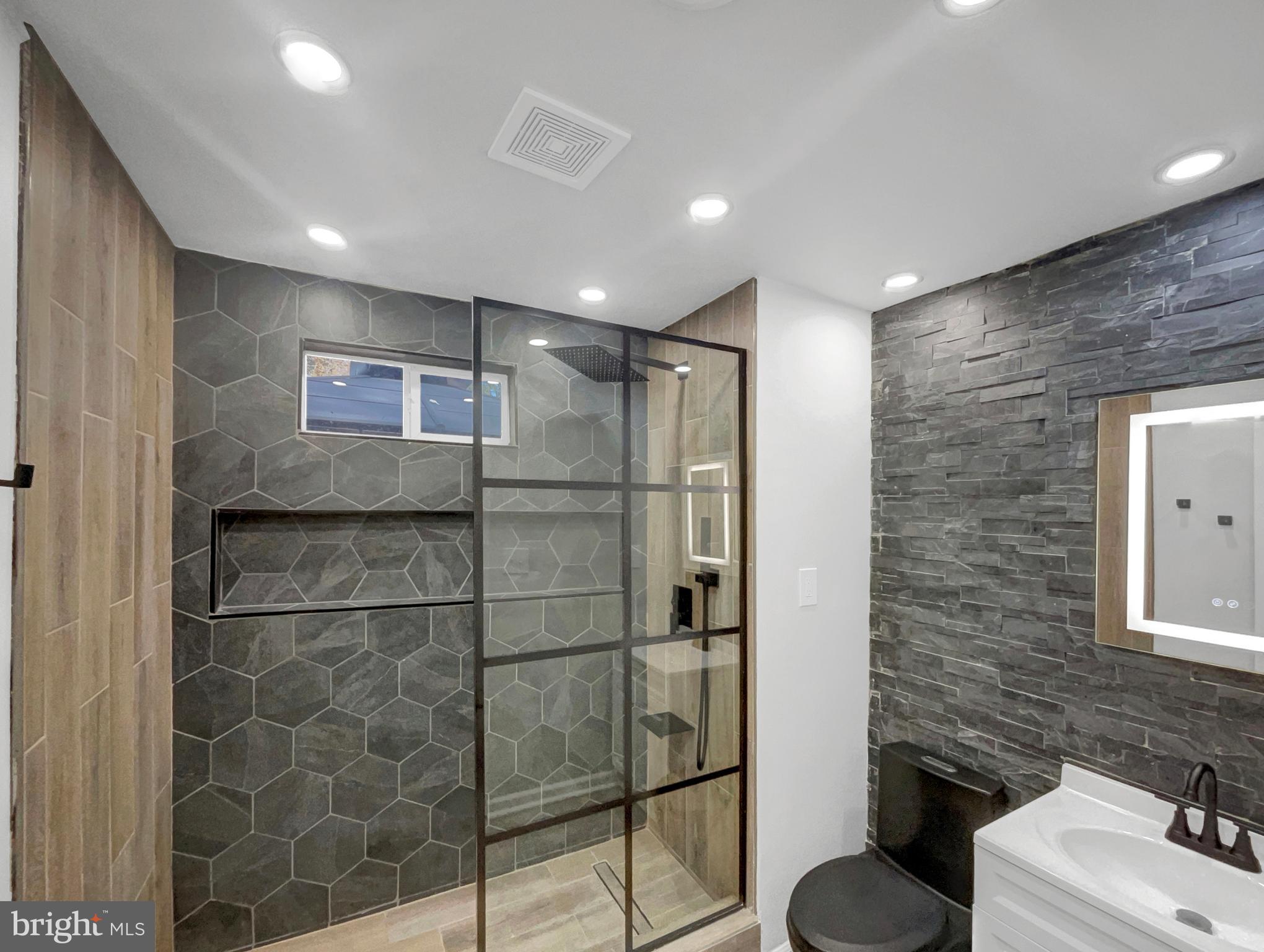 1101 Pine Lane Accokeek, MD 20607 - Photo 24 of 43 a bathroom with a shower