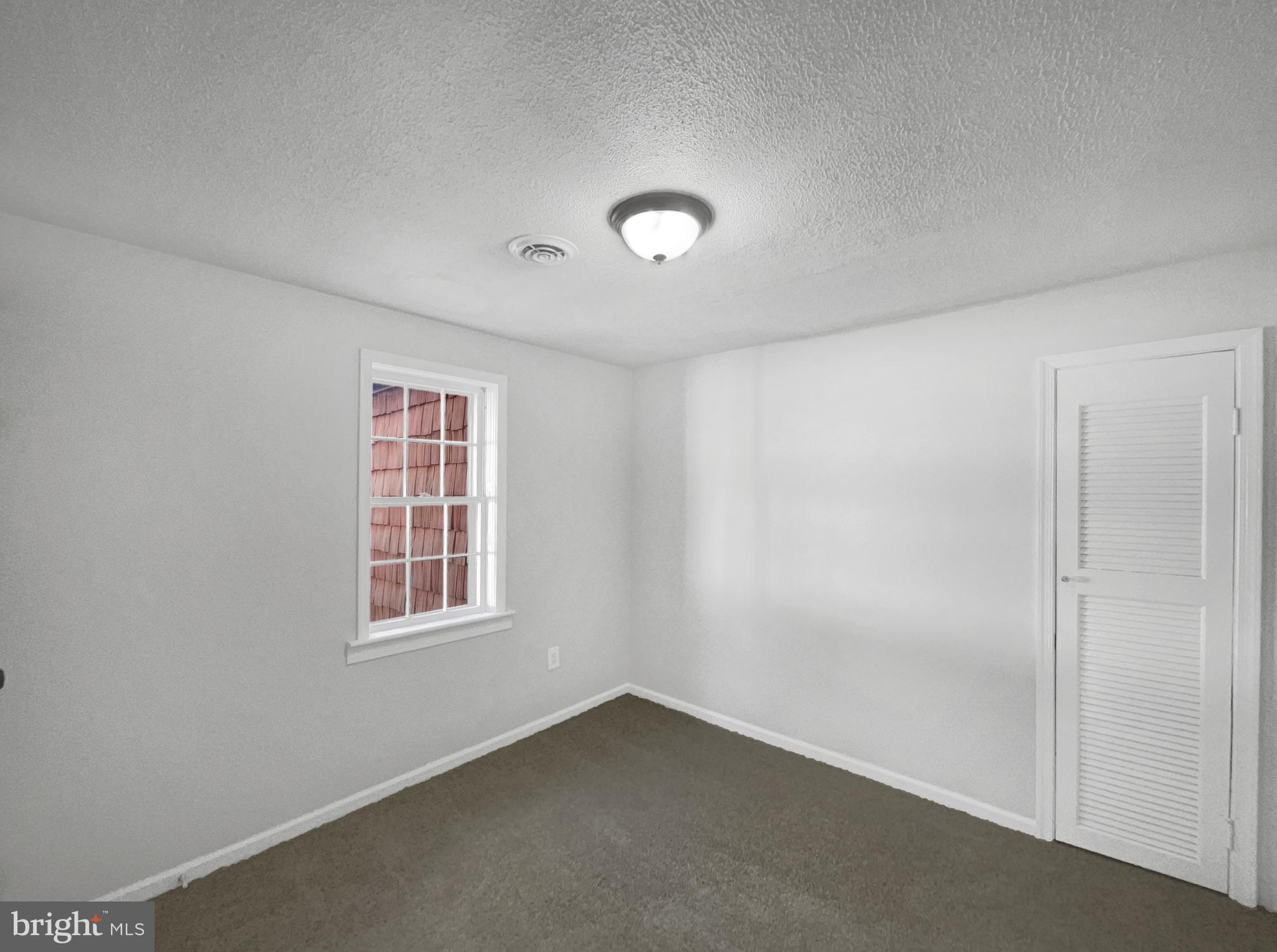1101 Pine Lane Accokeek, MD 20607 - Photo 27 of 43 an empty room with a window