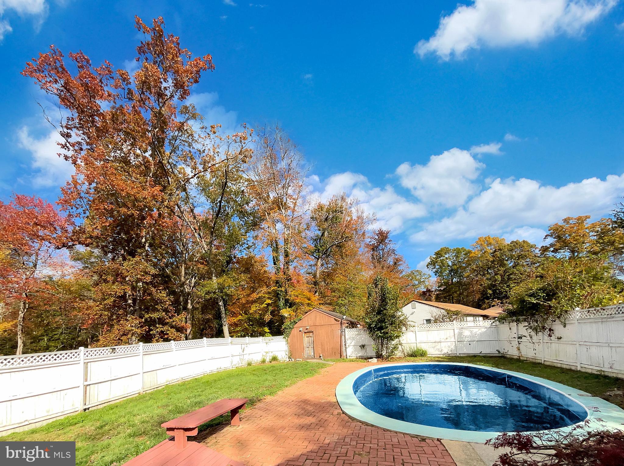 1101 Pine Lane Accokeek, MD 20607 - Photo 30 of 43 a backyard of a house with lots of green space