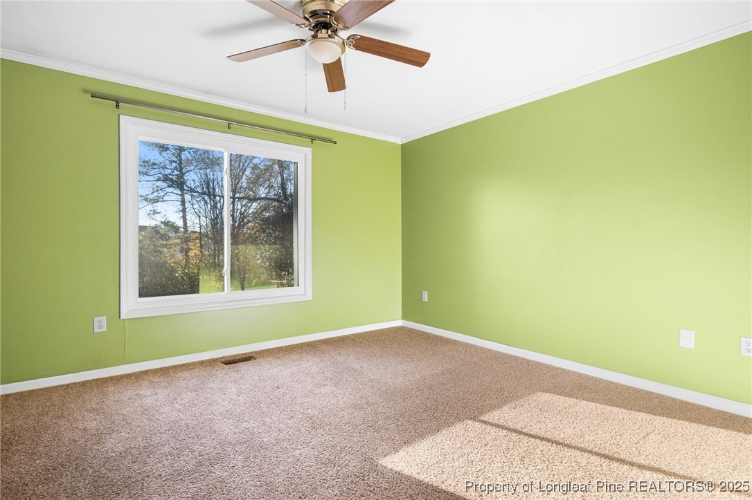 109 Ashton Place Spring Lake, NC 28390 - Photo 15 of 20 a view of an empty room with a window
