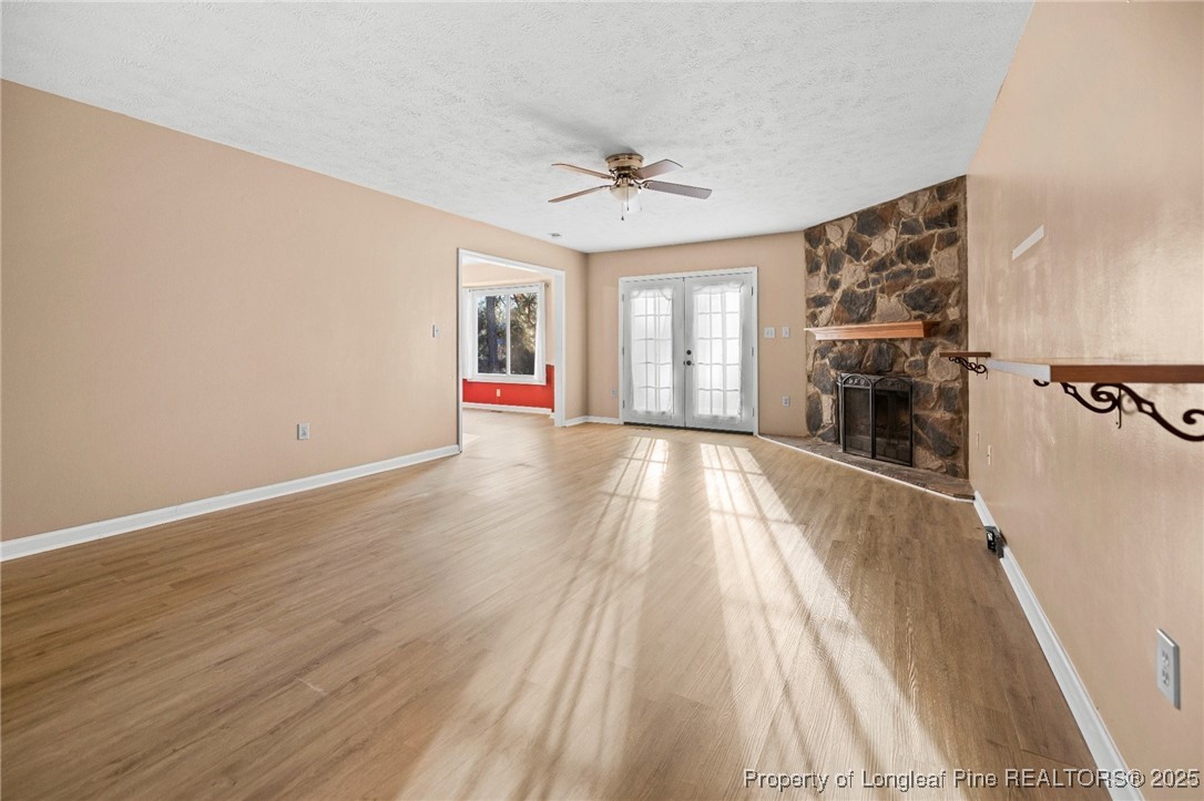 109 Ashton Place Spring Lake, NC 28390 - Photo 5 of 20 wooden floor in an empty room with a window