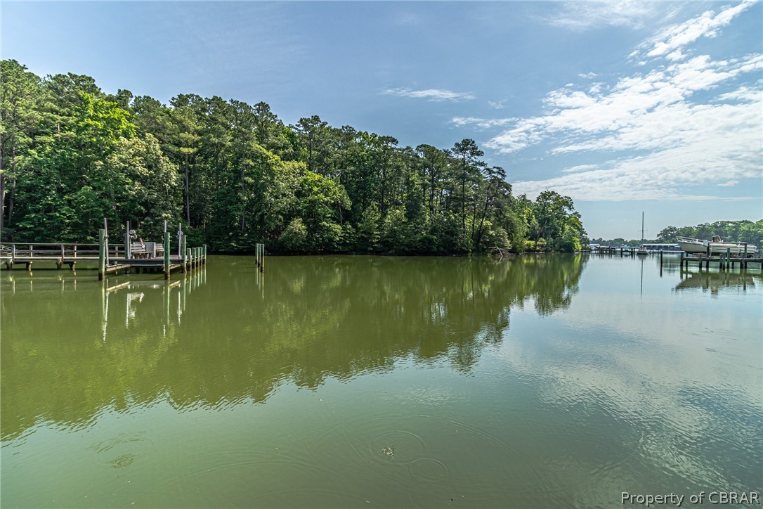 3215 Weems Road Weems, VA 22576 - Photo 18 of 50 a view of a lake with a yard