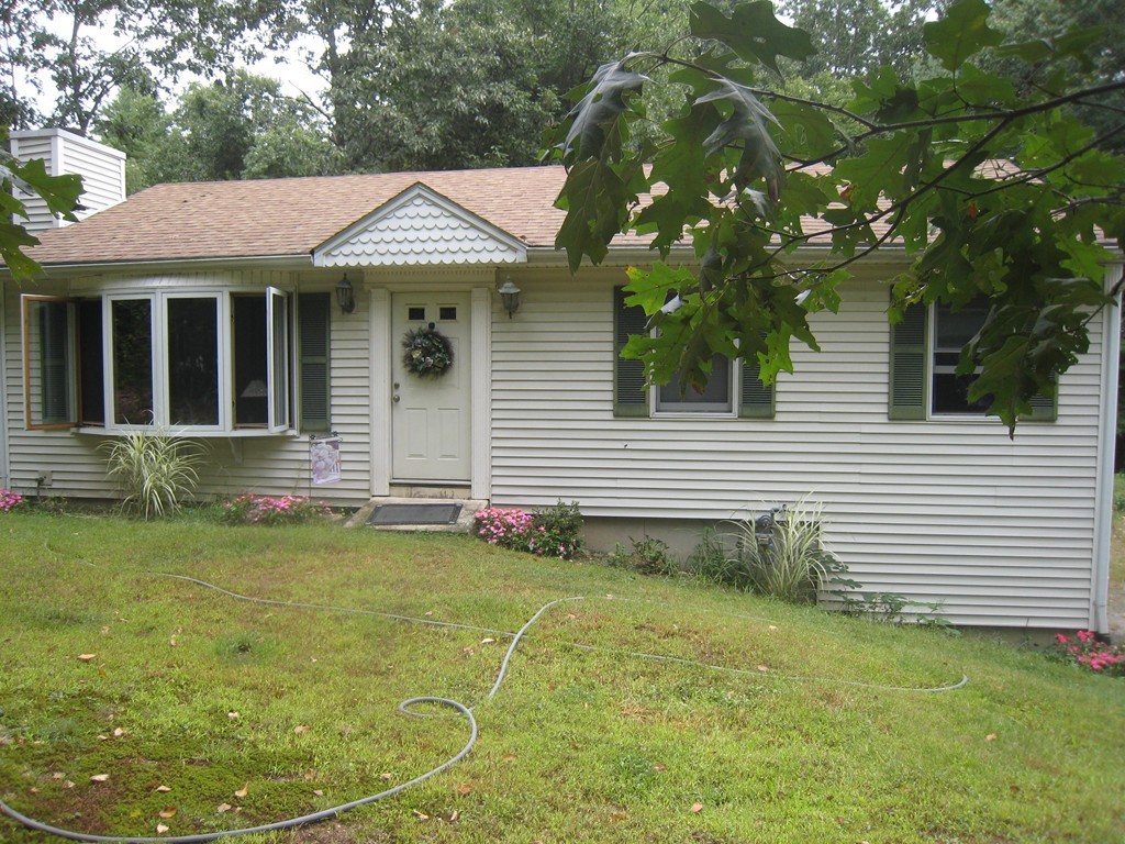 7 Ross Road Holyoke, MA 01040 - Photo 1 of 10 a front view of a house with a yard