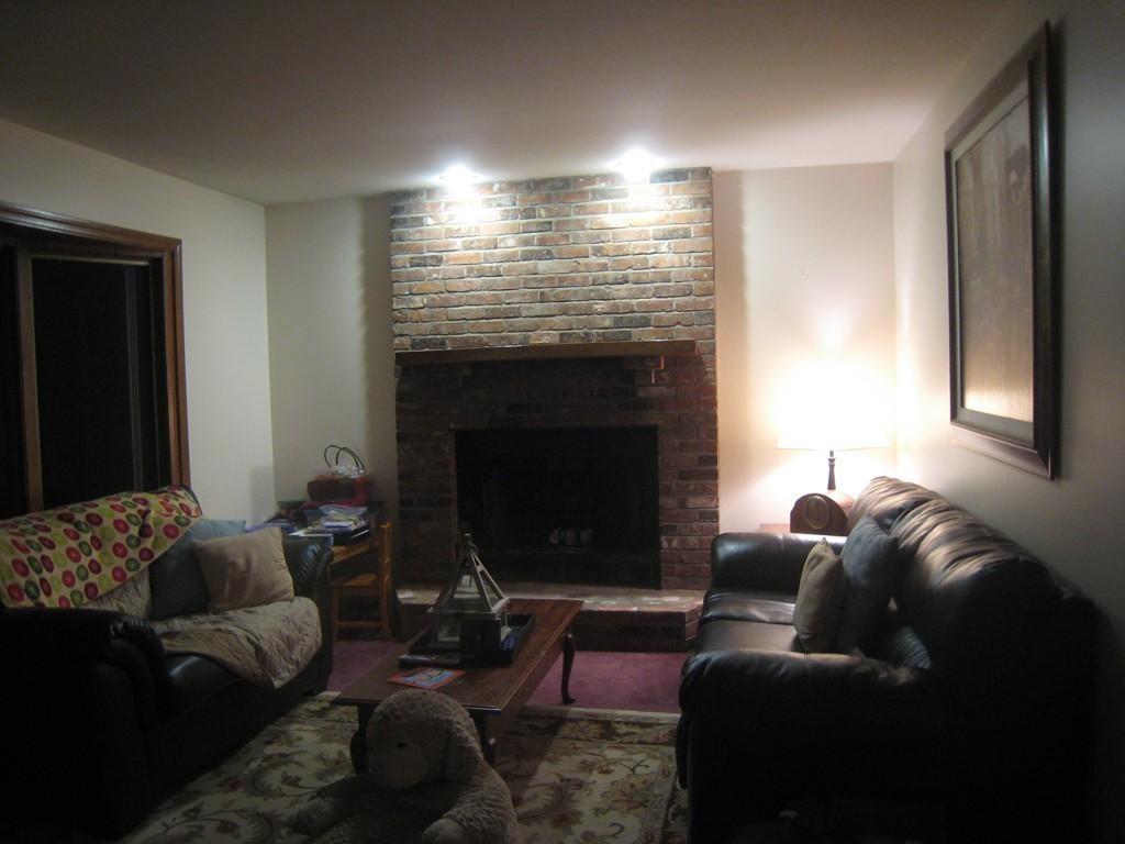 7 Ross Road Holyoke, MA 01040 - Photo 4 of 10 a living room with furniture and a fireplace
