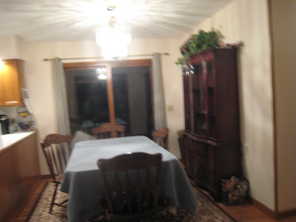 7 Ross Road Holyoke, MA 01040 - Photo 6 of 10 a bedroom with a bed and a mirror