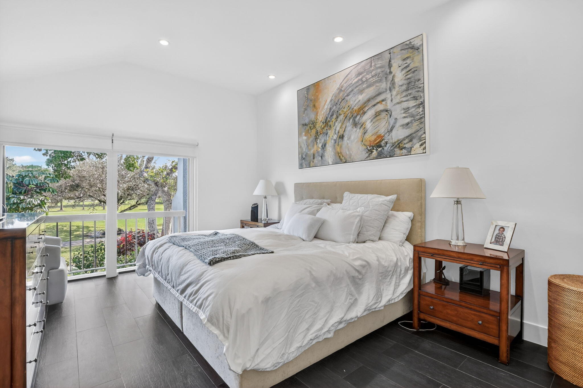 2306 Bridgewood Drive Boca Raton, FL 33434 - Photo 20 of 66 a bedroom with a bed and a large window