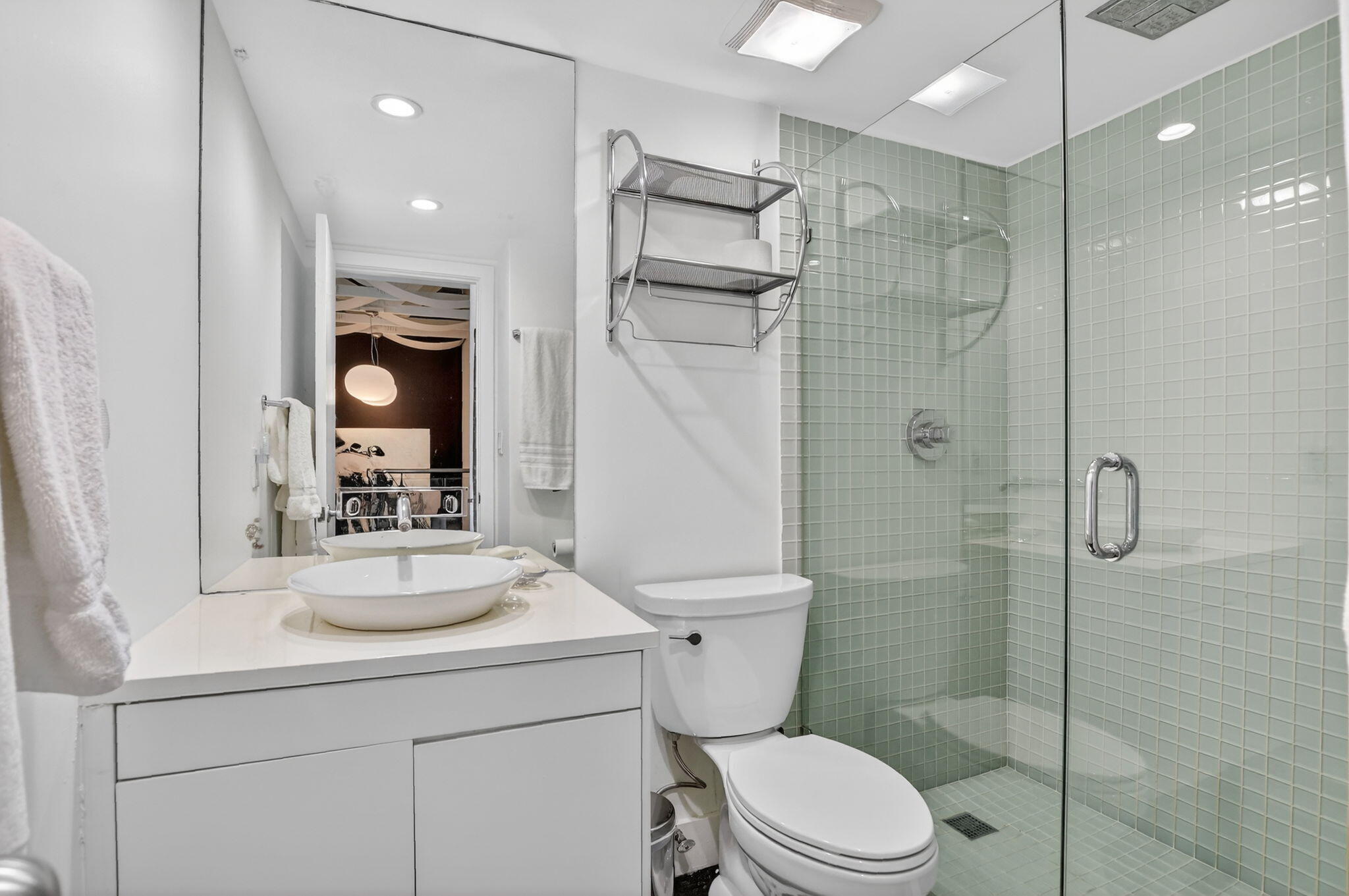 2306 Bridgewood Drive Boca Raton, FL 33434 - Photo 30 of 66 a bathroom with a sink toilet and shower