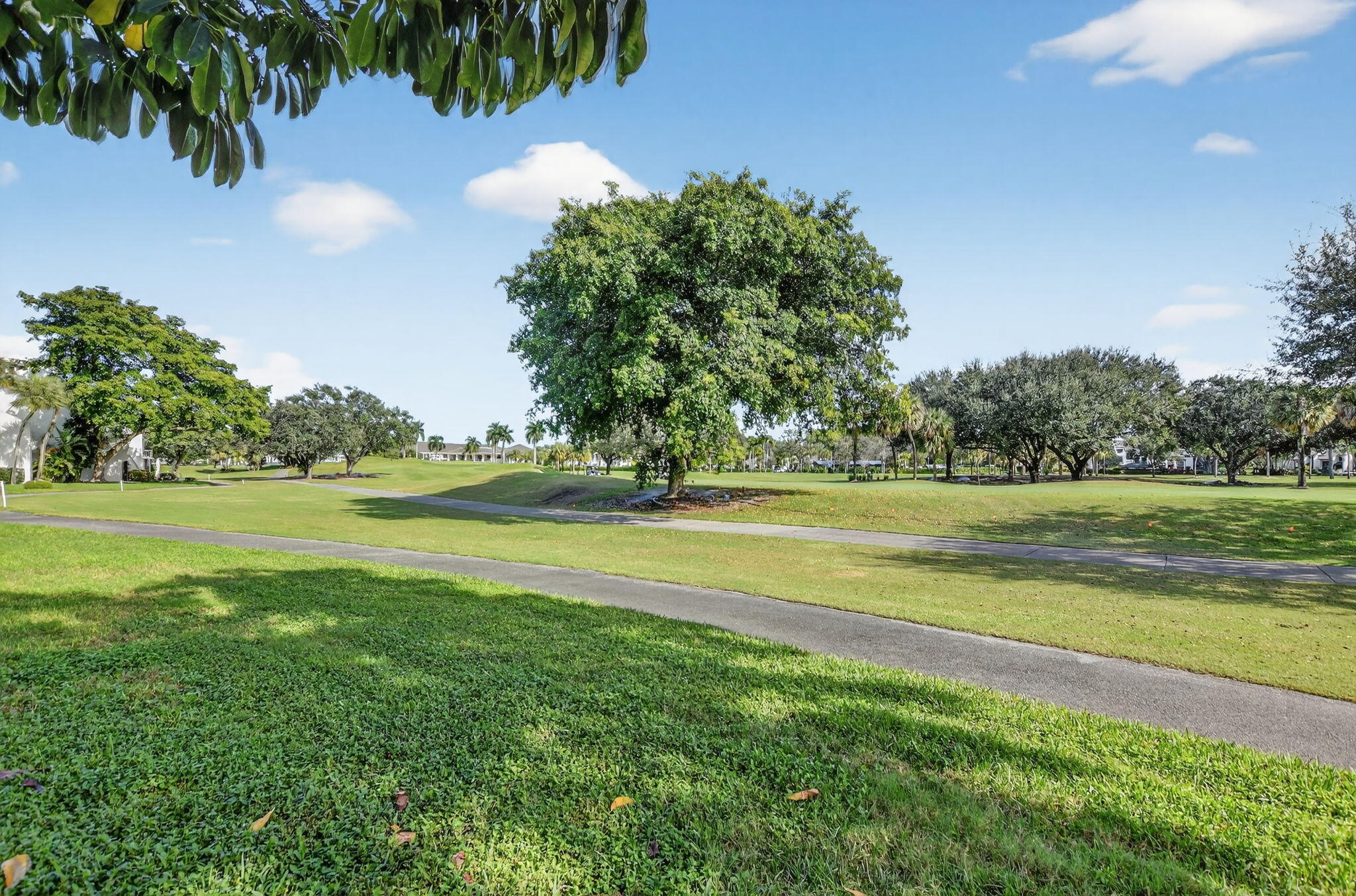 2306 Bridgewood Drive Boca Raton, FL 33434 - Photo 39 of 66 a view of outdoor space with garden and trees