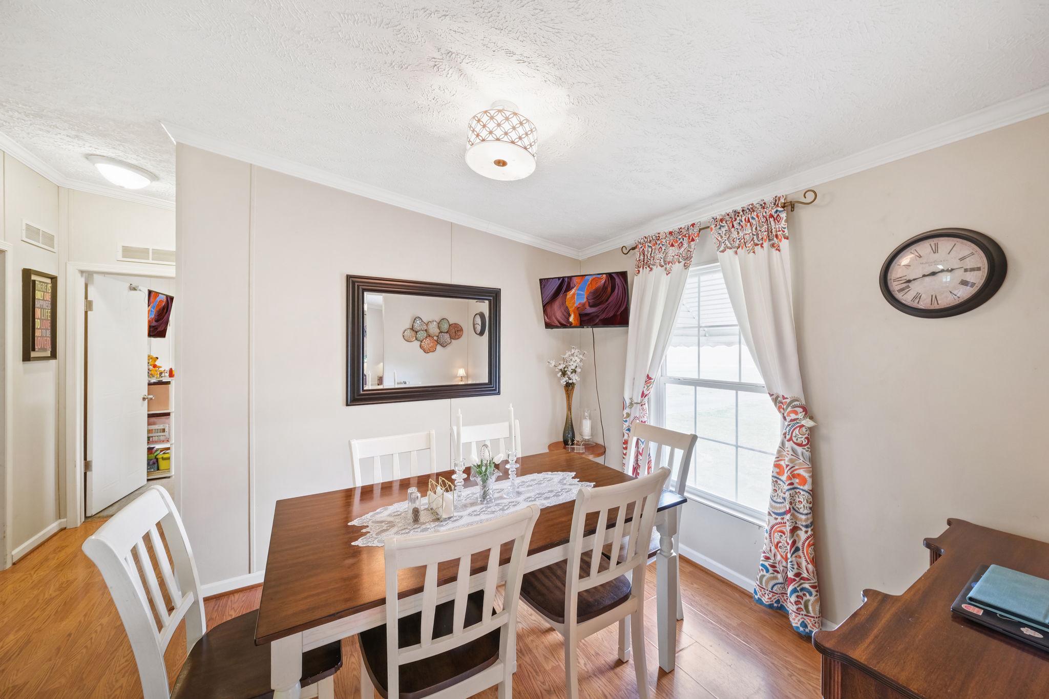 986 Lewis Level Road Tappahannock, VA 22560 - Photo 13 of 24 Bright dining space with cozy charm.