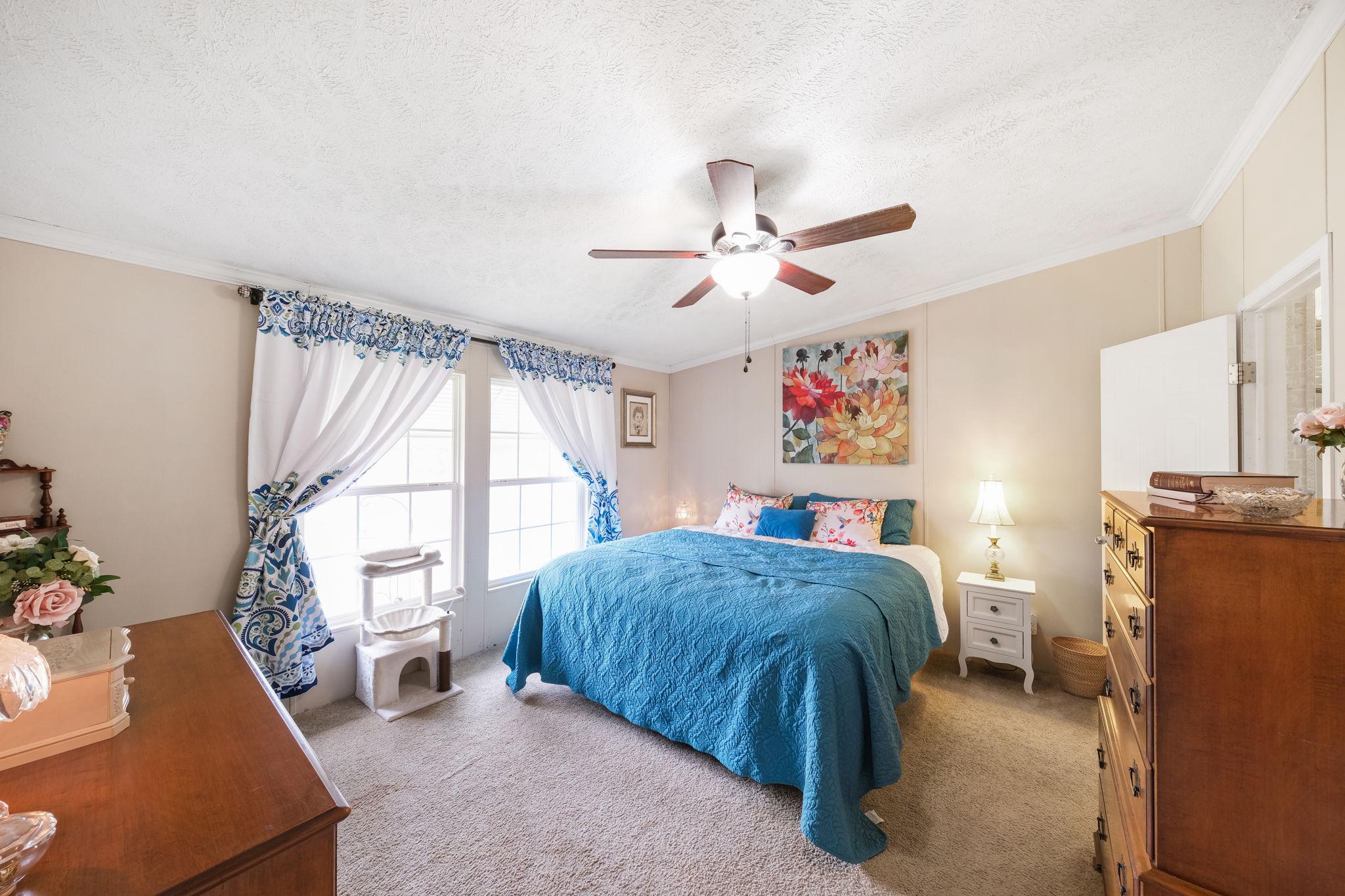986 Lewis Level Road Tappahannock, VA 22560 - Photo 16 of 24 Serene bedroom with natural light.