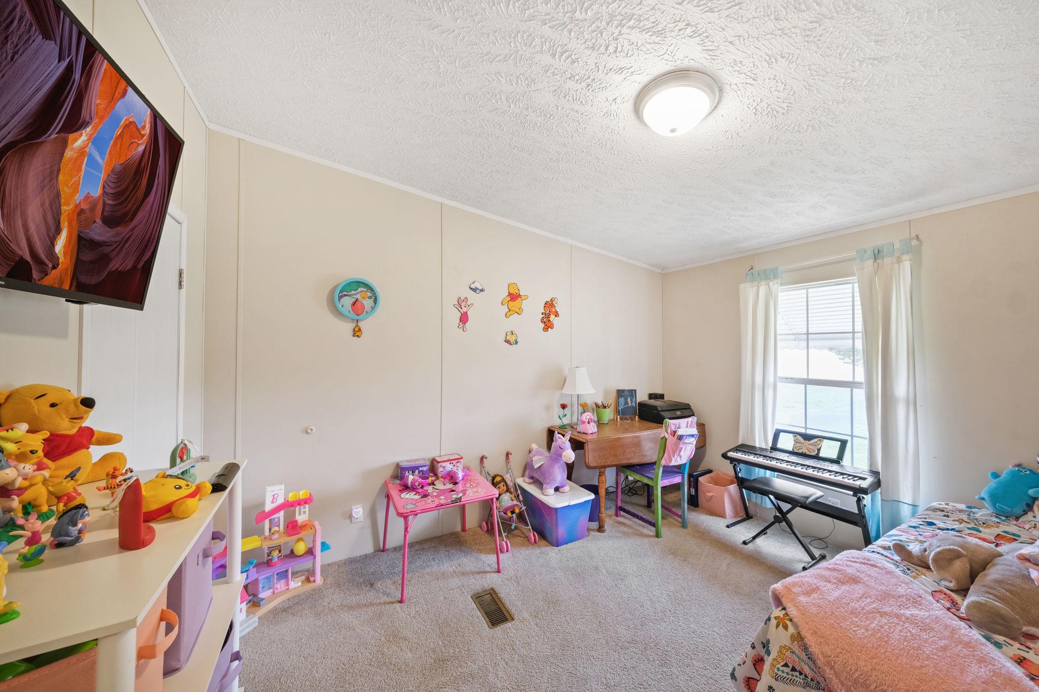 986 Lewis Level Road Tappahannock, VA 22560 - Photo 19 of 24 Bright and cheerful children's room.