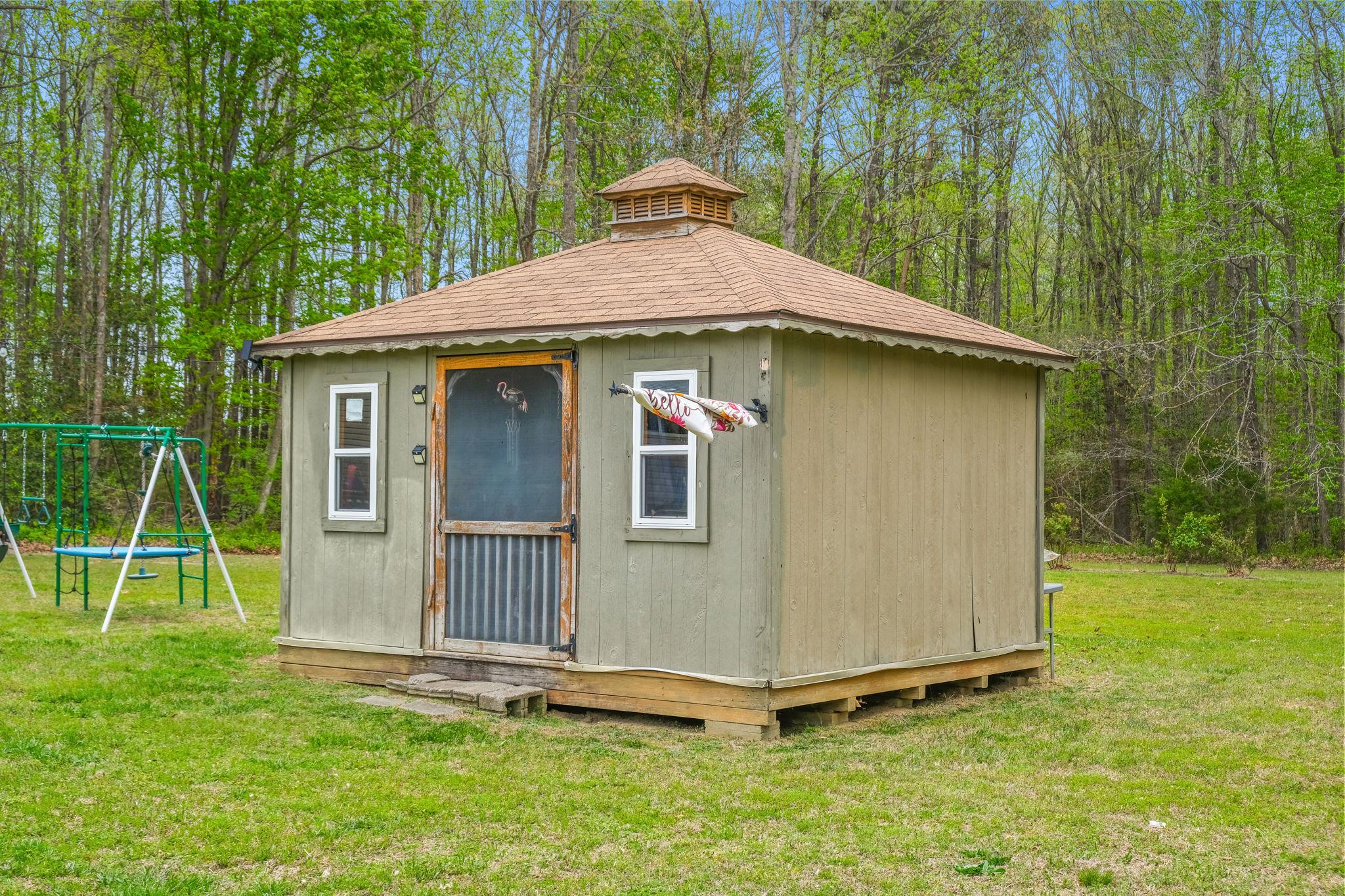 986 Lewis Level Road Tappahannock, VA 22560 - Photo 2 of 24 Charming garden retreat in nature.