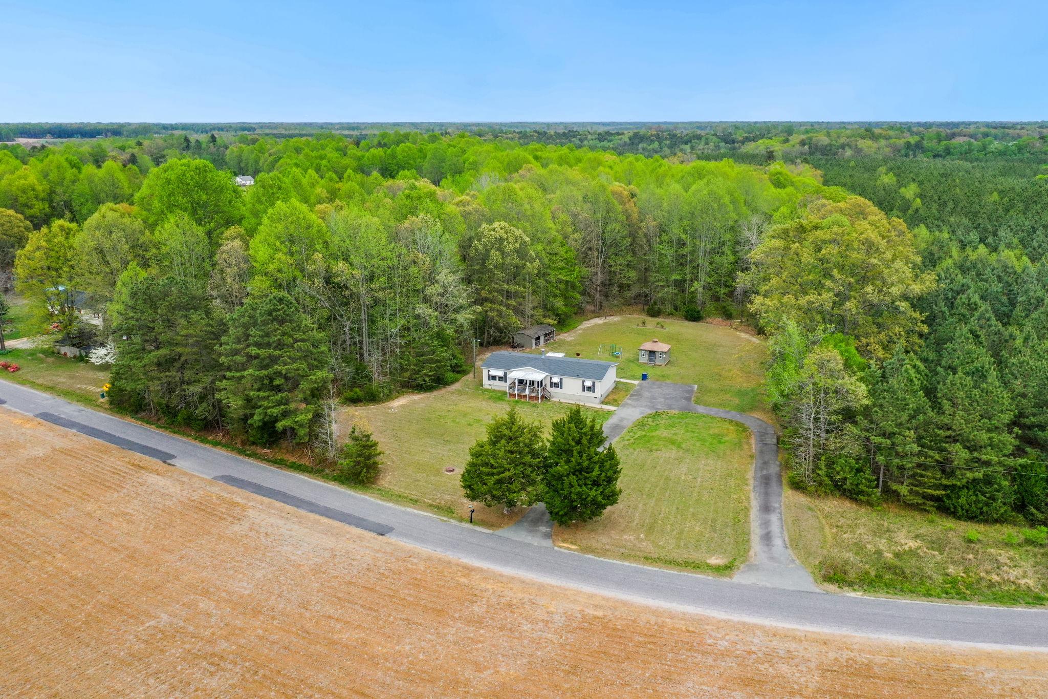 986 Lewis Level Road Tappahannock, VA 22560 - Photo 22 of 24 Serene retreat amid lush greenery.