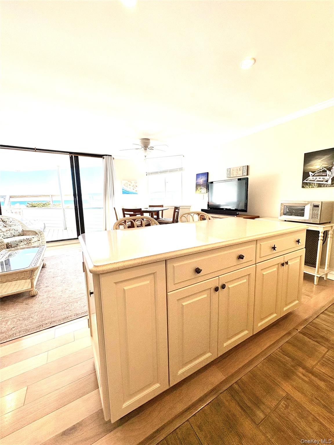 253 Dune Road, Unit 49 Westhampton Beach, NY 11978 - Photo 13 of 20 Kitchen Island